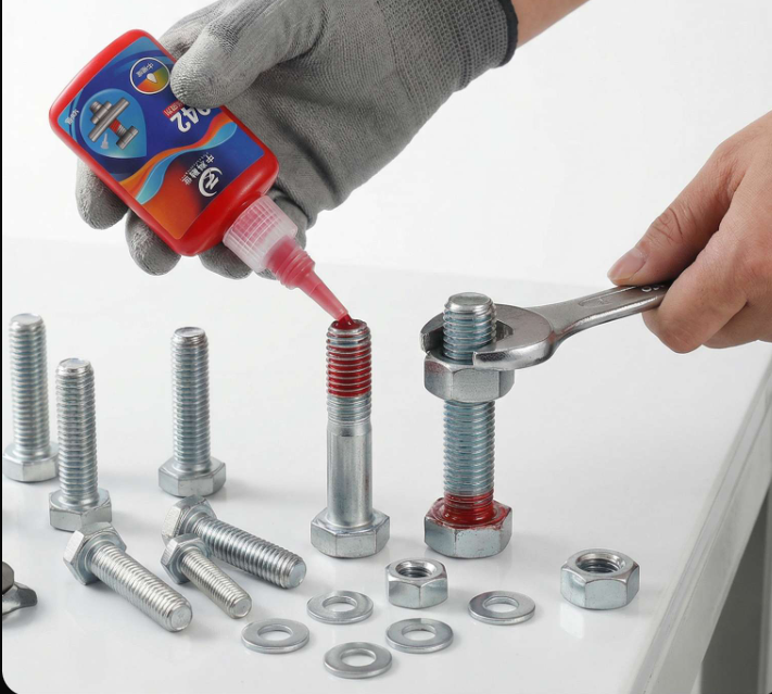 Threaded connection adhesive application
